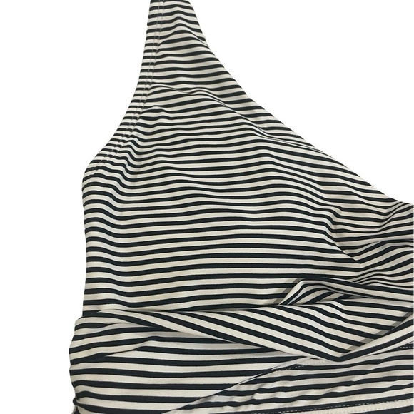 NipTuck cream and black striped swim top. Build in pads and adjustable straps. - Picture 2 of 7